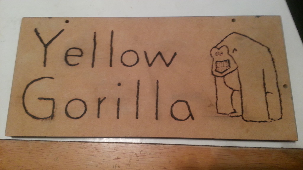 yellow gorilla solar carved sign example