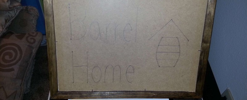 barrel home sign before solar carving