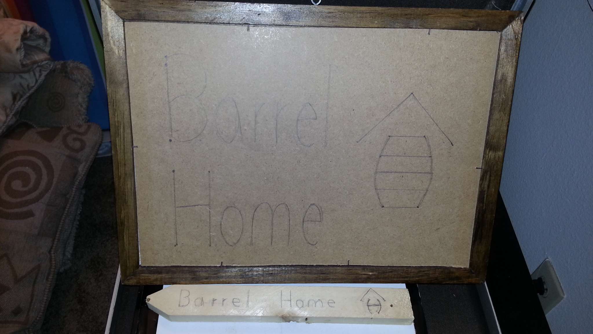 barrel home sign before solar carving